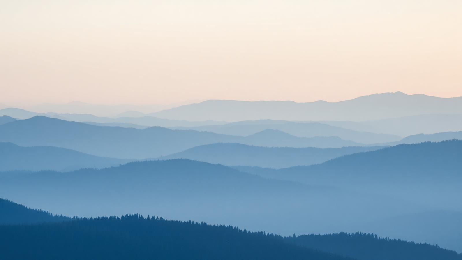 Layers of Montana mountain ridges at dawn